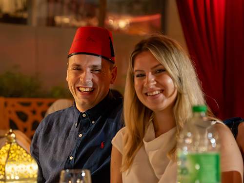 Smiling guests at the Jetour Ramadan event.