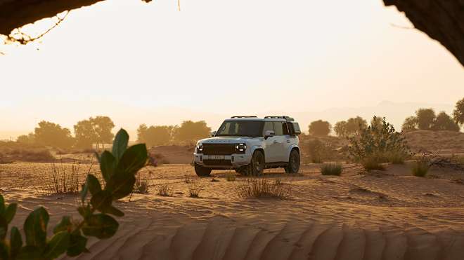 Jetour T2 i-DM 4x4 plug-in hybrid SUV standing in the desert, showcasing its rugged off-road design, modern exterior, and eco