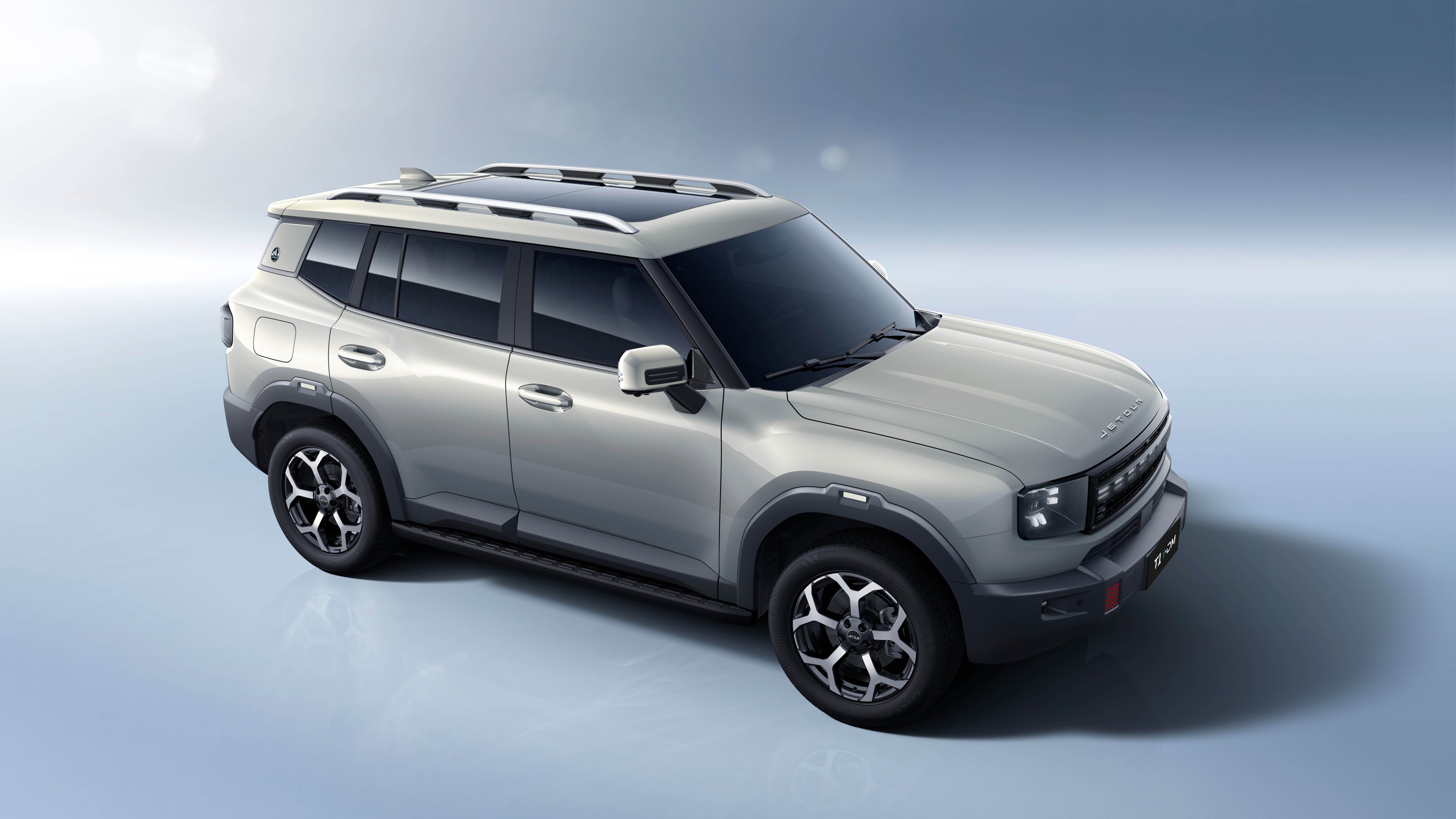 Front right three-quarter exterior view of the rugged Jetour T1-iDM plug-in hybrid SUV